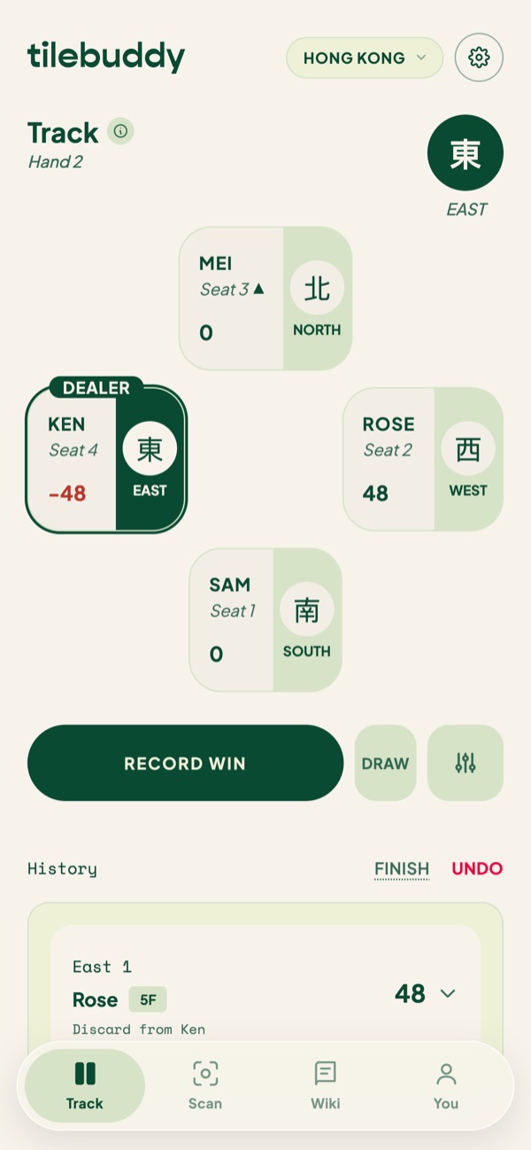 Board on hand 2 with the new dealer, and History showing East 1: Rose 5F, discard from Ken